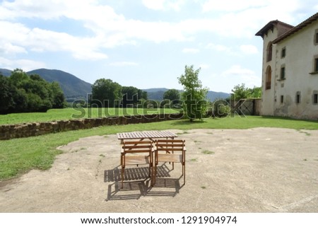 wood chairs isolated in the garden, relaxing place