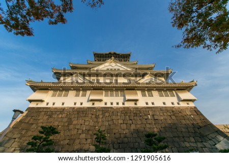 Beautiful of Osaka castle with blue sky in Japan.