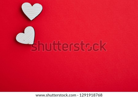couple of two wooden heart in love on red background.Valentine hearts concept. empty copy space. happy valentines day - 14th february