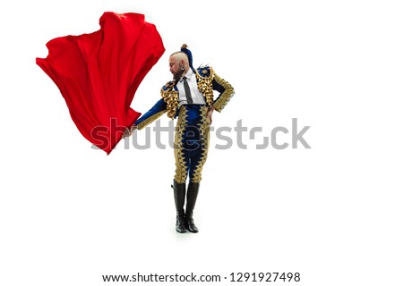 The elegance and graceful torero. The taming, achieving the goal, fight, warrior, mortification, conquest, boss, leadership, battle, win, winner. Business concept  of tamer, conqueror and protector.  Royalty-Free Stock Photo #1291927498