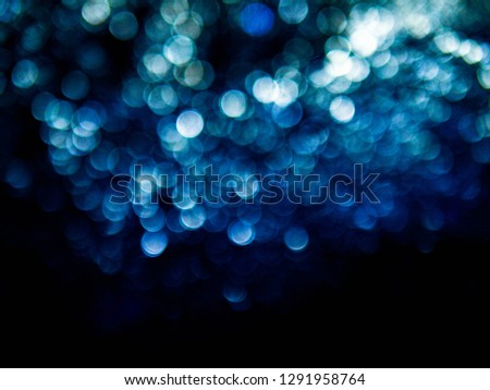 Colorful bokeh abstract, isolated on black background. Soft blurred lights