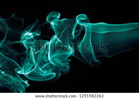 Abstract colored wave smoke on black  background