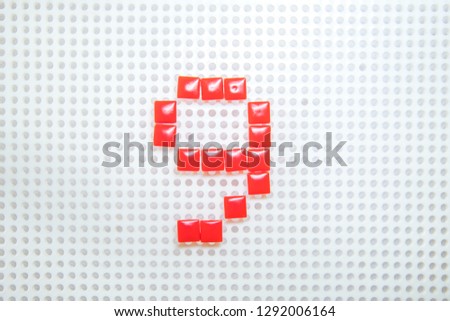 number 9 created with children toys similar to pixels
