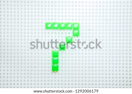 number 7 created with children toys similar to pixels