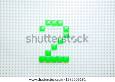 number 2 created with children toys similar to pixels