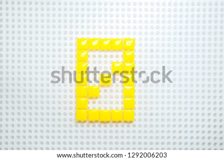 number 0 created with children toys similar to pixels