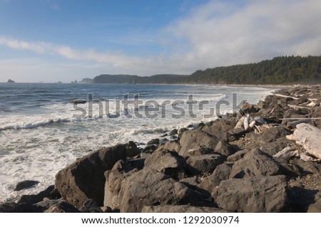 Surf and grey stones in La Push beach area, La Push, WA