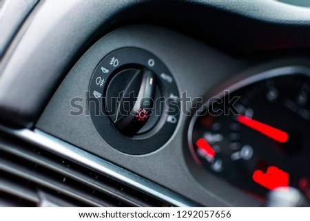 Headlight switch on a cars panel