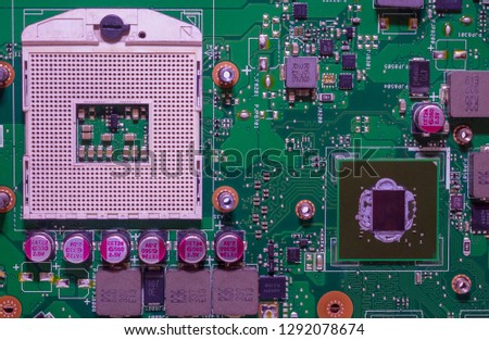 Computer chip with capacitors on white isolated background