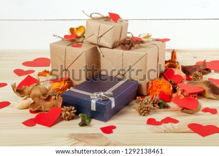 Gift boxes on wooden table. Gift image suitable for Valentines Day, Christmas, New Year or Birthday. With copyspace