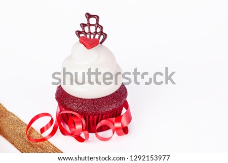 A valentine creamy cupcake with heart  - happy valentine's day