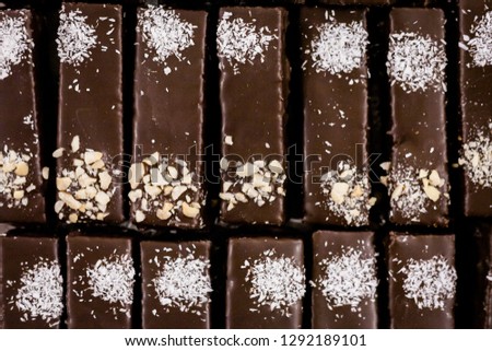 Small confectionery made of sweet pastry, chocolate coated and rectangular marmalade filling