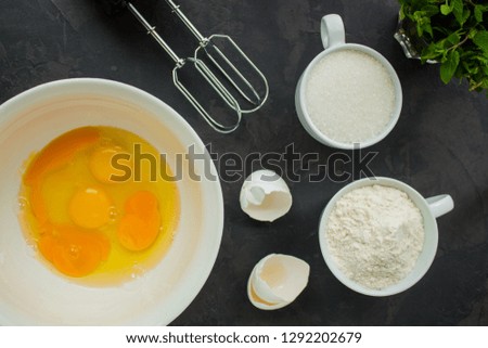 raw dough (eggs, flour and other ingredients). food background. copy space
