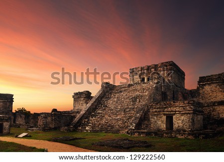 Castillo fortress at sunset in the ancient Mayan city of Tulum, Mexico Royalty-Free Stock Photo #129222560