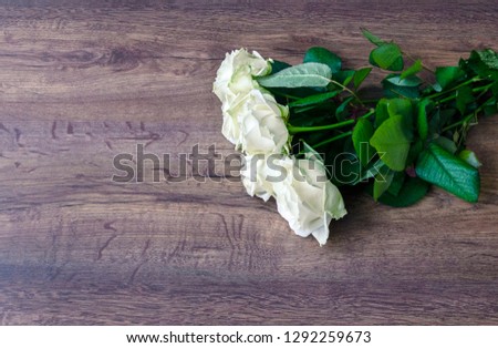 beautiful bouquet of flowers of roses on a light background, close-up