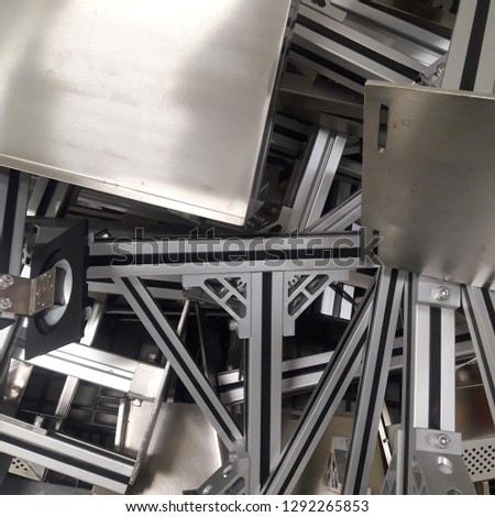 Steel and stainless steel that are stacked together on the floor