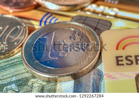 Euro banknotes and coins close up. Chip. Contct less
