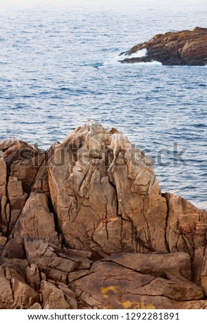 ROCKS IN THE SEA WITH DETAILS OF CRACKS CAUSED BY THE SEA IN THE COAST OF NORTH OF SPAIN