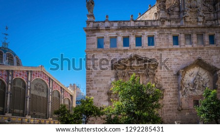 A gorgeous photo of the exterior facade of the touristic and popular the Llotja, also known as La Lonja, a building used for trading silk during the Middle and Early Modern Ages in Valencia, Spain