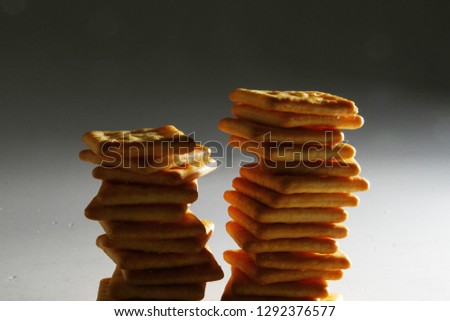 Biscuit crackers / A cracker is a flat, dry baked food typically made with flour.