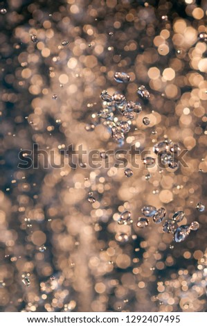 Close up of droplets captured with high speed and shallow depth of field