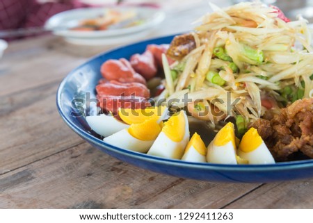 Papaya salad on the table in the restaurant.