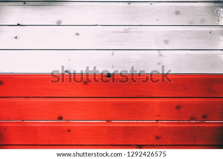 National flag of Poland  on a  wooden background