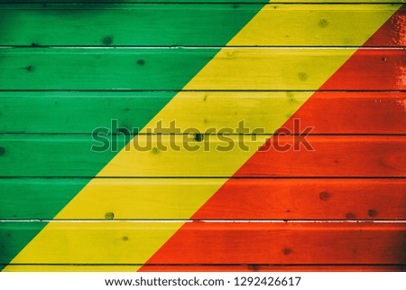 National flag of Republic of the Congo on a wooden background