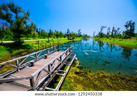 A forest park by the sea in the eastern part of Taiwan, Asia, where the clear artificial lake is a feature.
