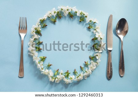 Spring table setting with a cherry blossom