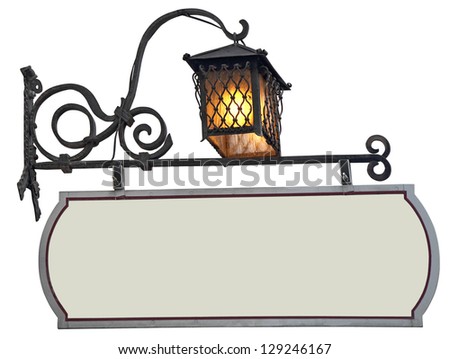Blank, green shop sign made of wrought iron with lantern, isolated on white background