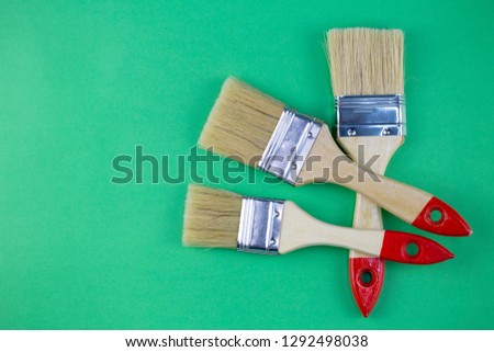 brushes for drawing, painting on a green background