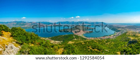 Aerial view of greek town Kastoria surrounded by Orestiada lake
