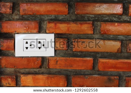 Socket on brick wall use for backround