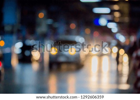 Abstract photo blurred of colorful Light at parking area.