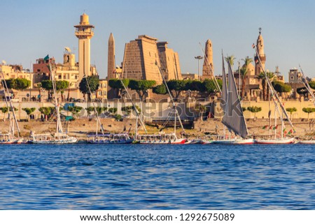 Luxor Temple is a large Ancient Egyptian temple complex on east bank of Nile river in Luxor (ancient Thebes). View from Nile river Royalty-Free Stock Photo #1292675089