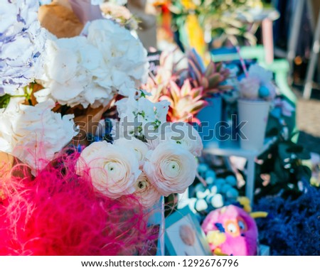 Beautiful pink peonies, yellow ranunculus flower bouquet and others. Spotted on the flower market.