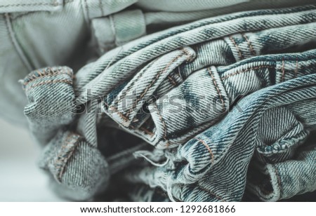 Jeans background. Detail of nice blue jeans. Jeans texture or denim background. Blue denim texture.