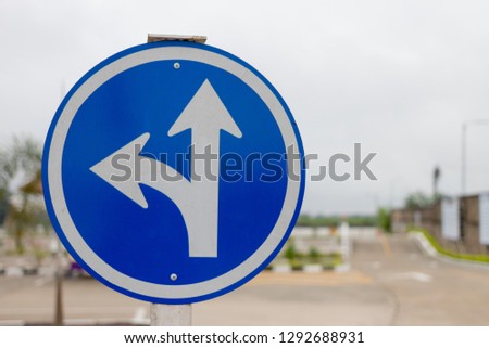 Blue three separate signs and blur background
