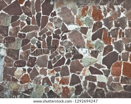 Texture of the stone wall brown color