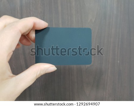 Black card image in hand
