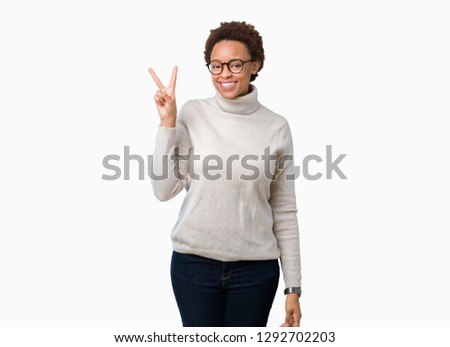Young beautiful african american woman wearing glasses over isolated background showing and pointing up with fingers number two while smiling confident and happy.