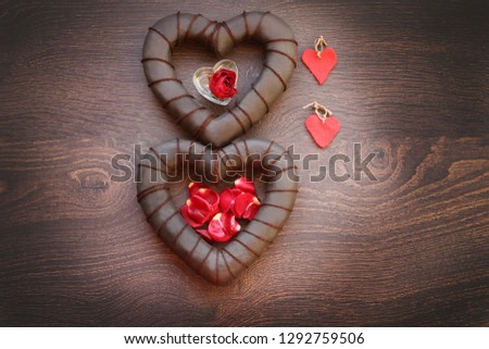 Hearts on a wooden background. Valentine's day.