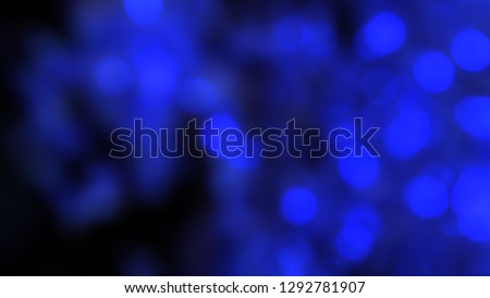 background with blurred bokeh lights in blue color