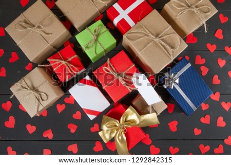 Gift boxes on wooden table. Gift image suitable for Valentines Day, Christmas, New Year or Birthday. With copyspace