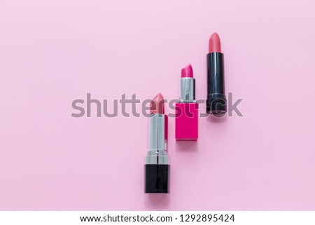 Set of lipsticks isolated on color background. Red, pink, wine, vinous . Colorful Tones,Lipstick tints palette, Professional Makeup and Beauty. Beautiful Make-up concept. Lipgloss.