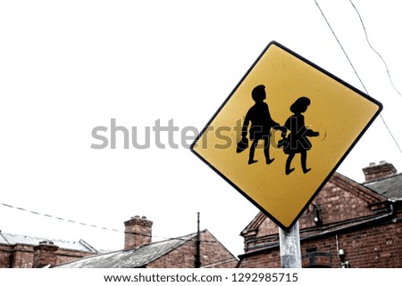 School children caution sign in Belfast