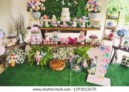 cake table decoration in children's party with garden theme