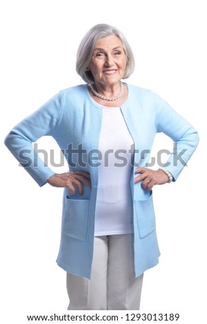 portrait of beautiful senior woman, posing on white background