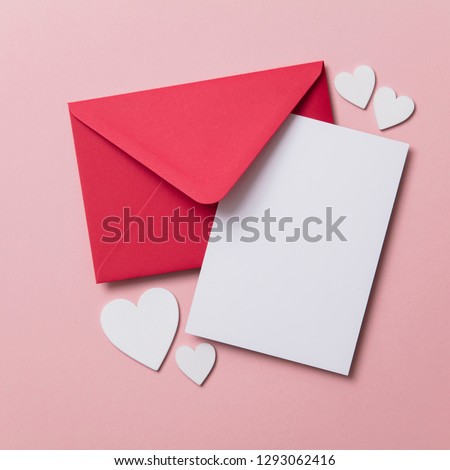 Love letter. white card with red paper envelope mock up Royalty-Free Stock Photo #1293062416